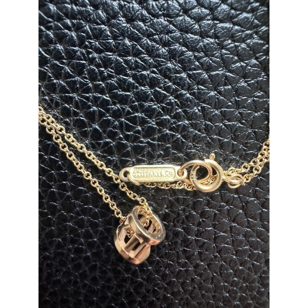 Tiffany & Co. 18k Rose Gold 6mm Open Barrel Pendant Charm Necklace
